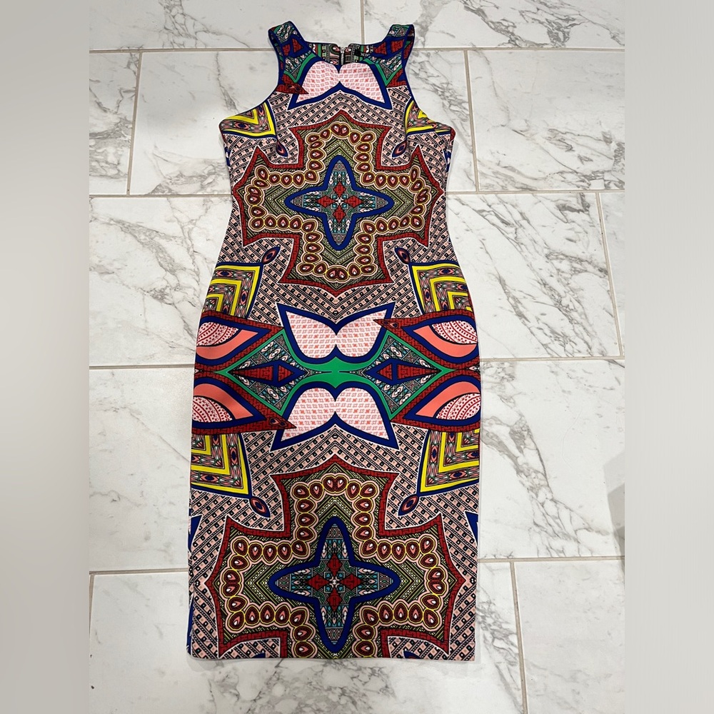 XOXO woman size medium geometric design dress.